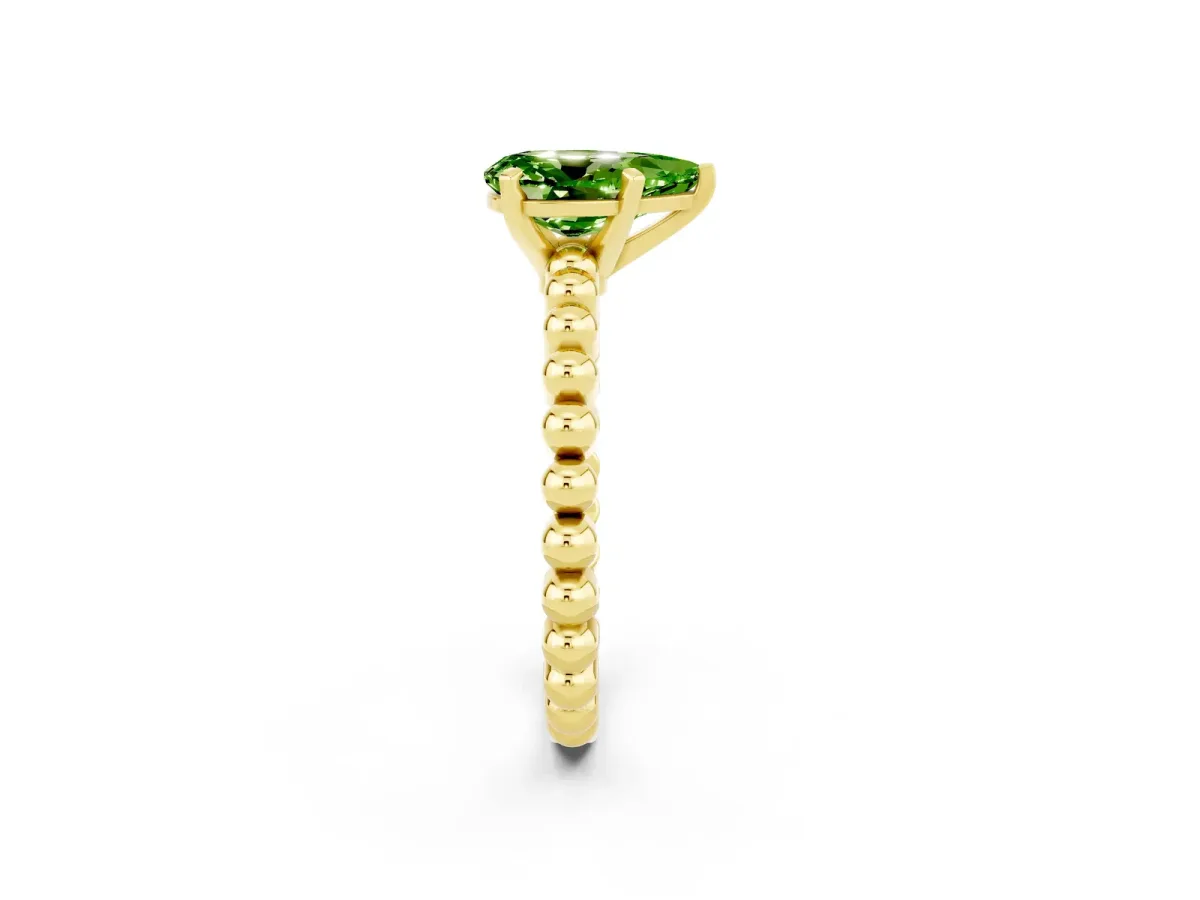 Pear Cut Peridot Solitaire Ring with Beaded Band and Prong Setting Yellow gold