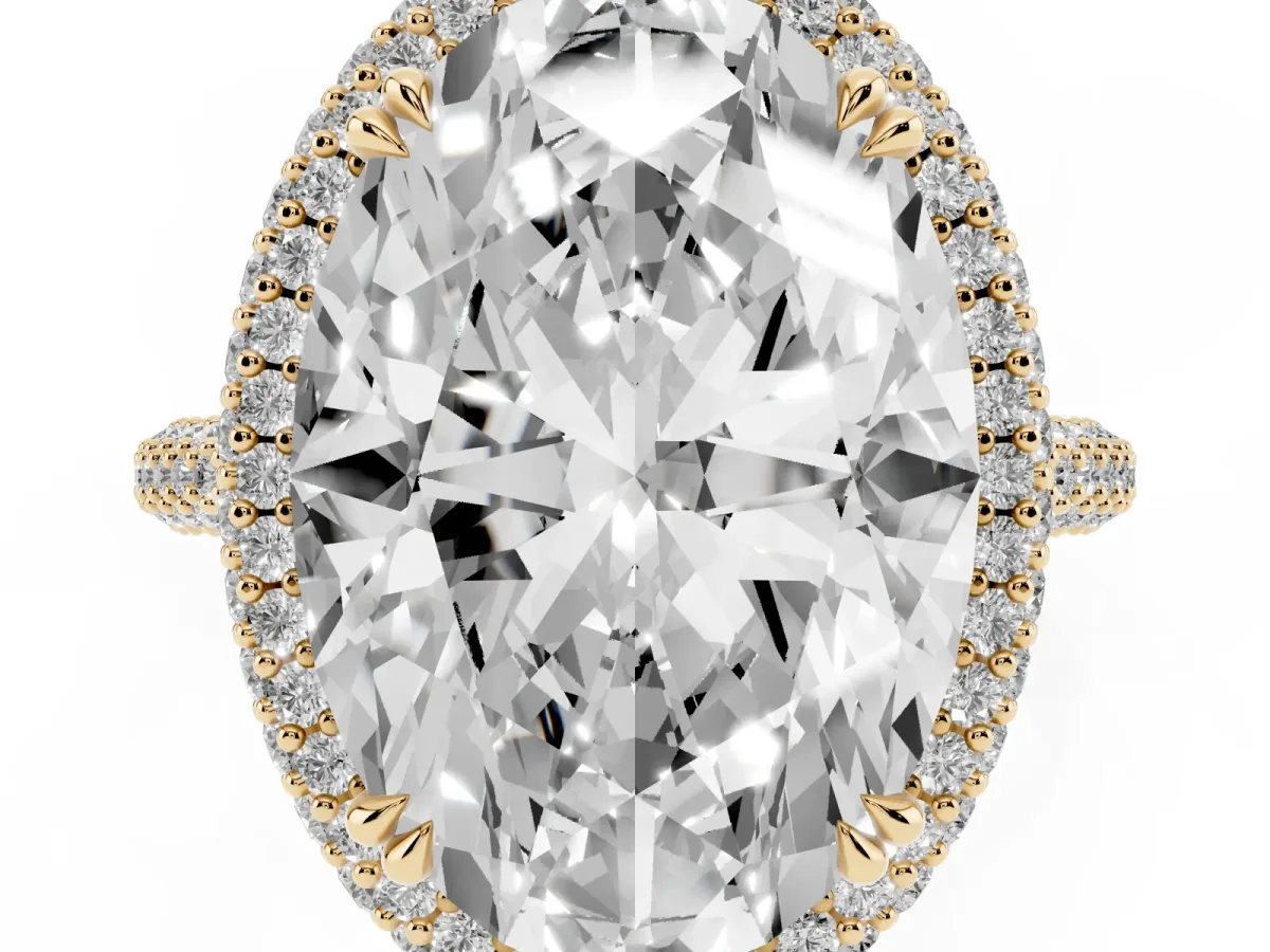 Oval Diamond Halo Ring with Round Diamond Accents Yellow gold
