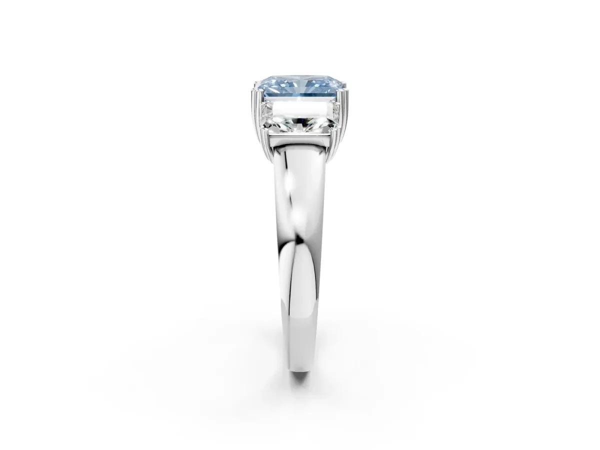 Fancy Blue Three-Stone Radiant Cut Cut Diamond Ring with Channel Set Band and Four-Prong Setting Silver