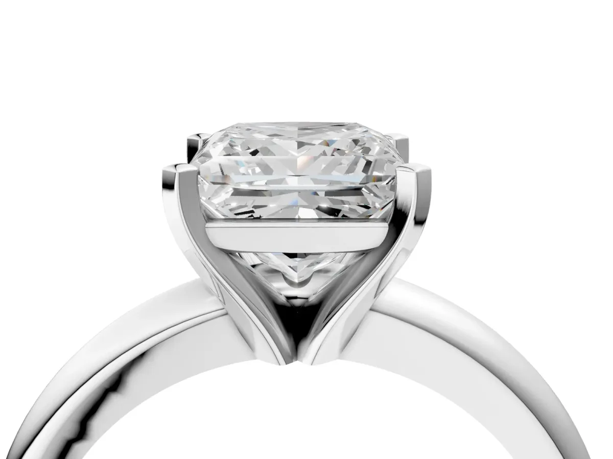 Princess Cut Diamond Solitaire Engagement Ring with Round Band and Four-Prong Setting Silver
