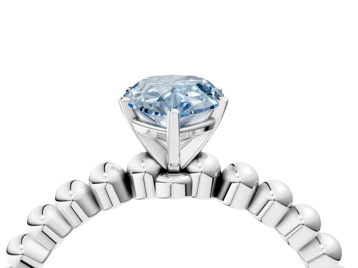 Fancy Blue Pear Cut Diamond Solitaire Ring with Beaded Band and Prong Setting Silver