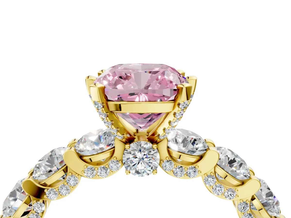 Fancy Pink Cushion Cut Diamond Side Stone Engagement Ring with Four-Prong Setting Yellow gold
