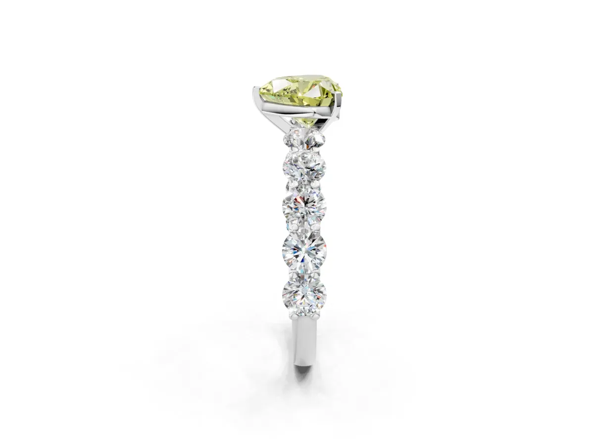 Fancy Yellow Heart Cut Diamond Prong Setting with Side Stones on a Pave Band Silver