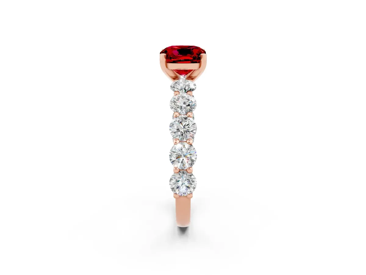 Cushion Cut Ruby Prong Setting with Side Stones on a Pave Band Rose gold
