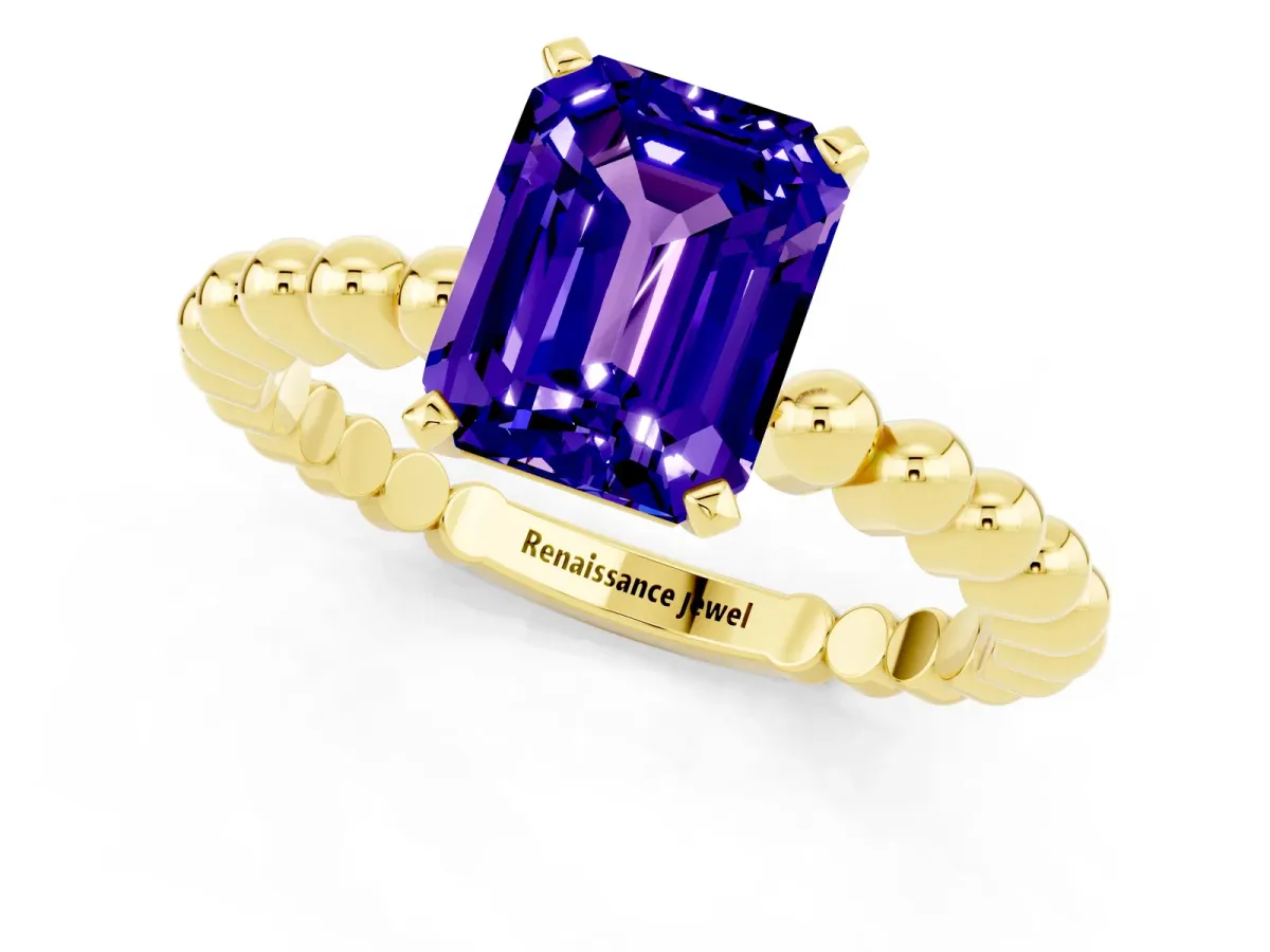 Emerald Cut Tanzanite Solitaire Ring with Beaded Band and Prong Setting Yellow gold