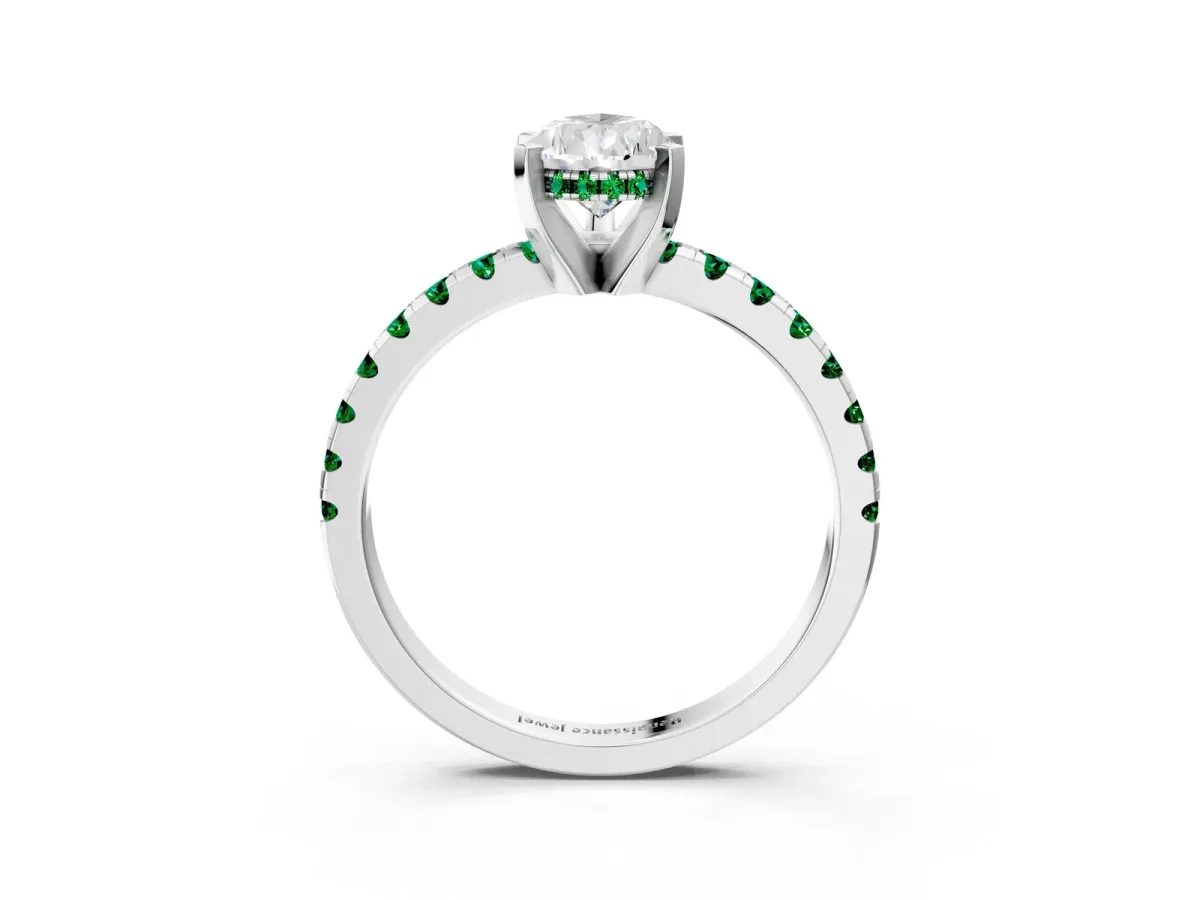 Pear Cut Diamond Solitaire Ring with Round Emerald Pavé Band and Four-Prong Setting Silver