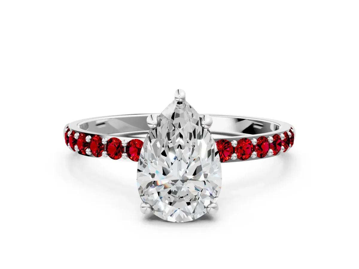 Pear Cut Diamond Solitaire Ring with Round Ruby Pavé Band and Prong Setting White gold