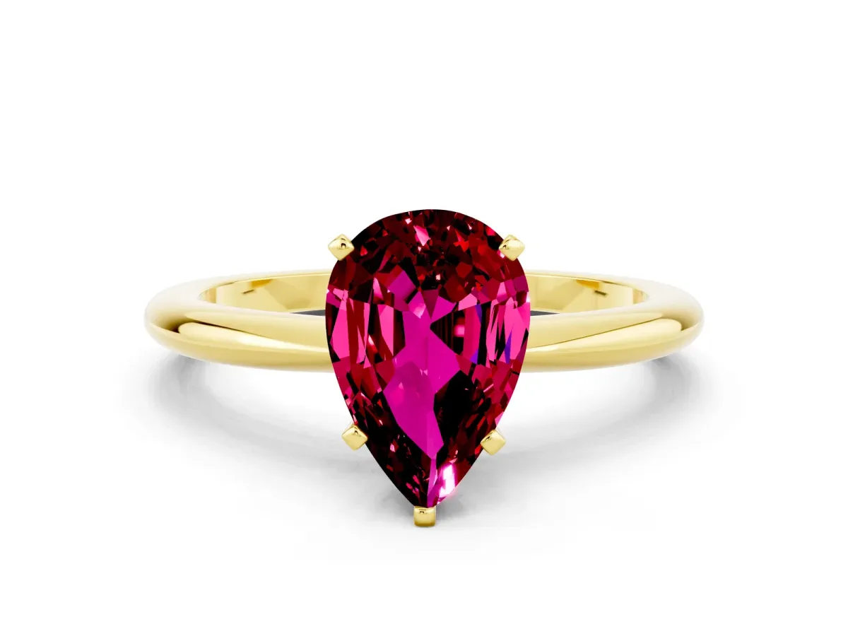 Pear Cut Garnet Solitaire Ring with Six-Prong Setting and Classic Band Yellow gold
