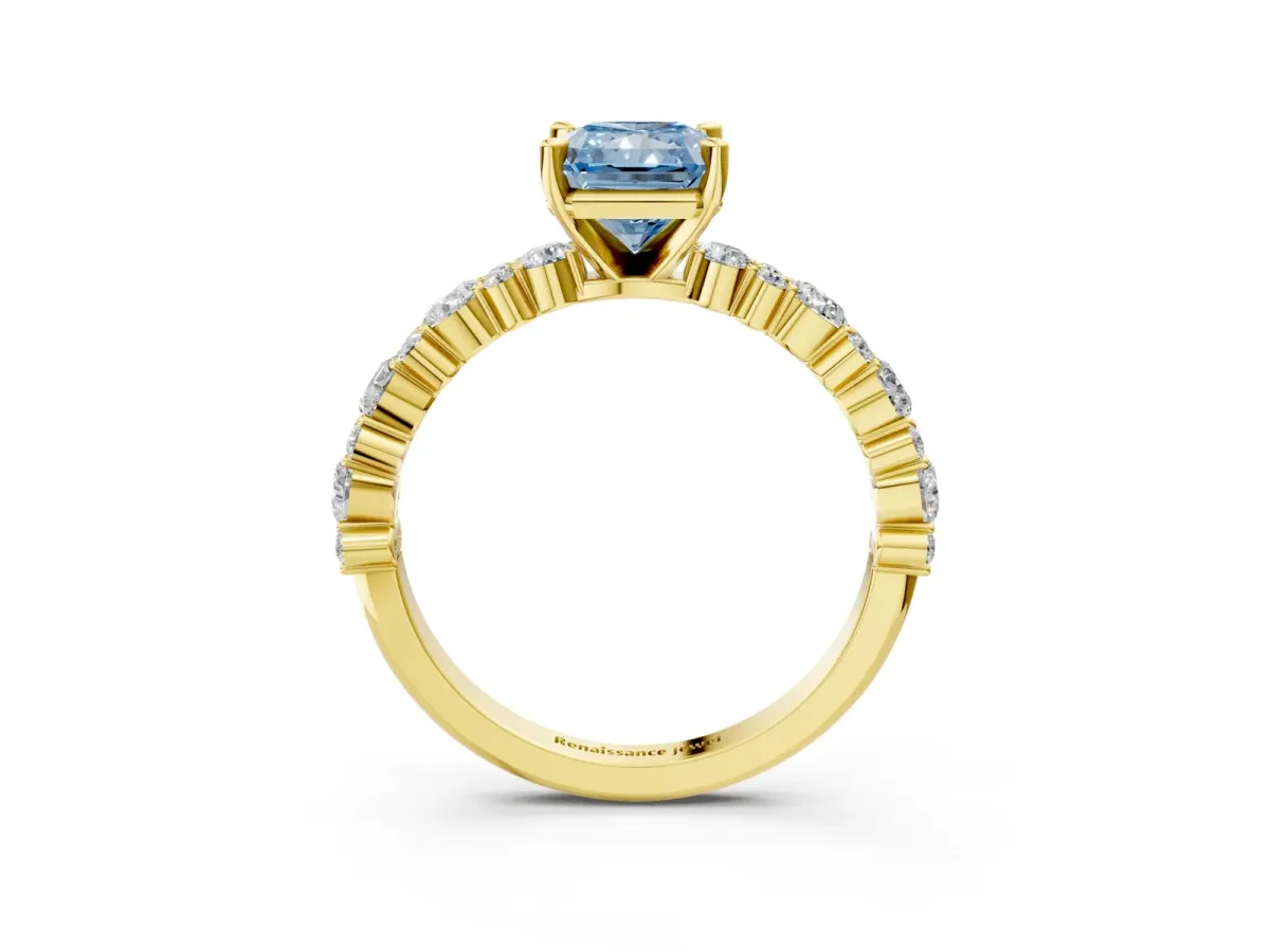 Fancy Blue Radiant Cut Diamond Side Stone Solitaire Ring with Round and Four-Prong Setting Yellow gold