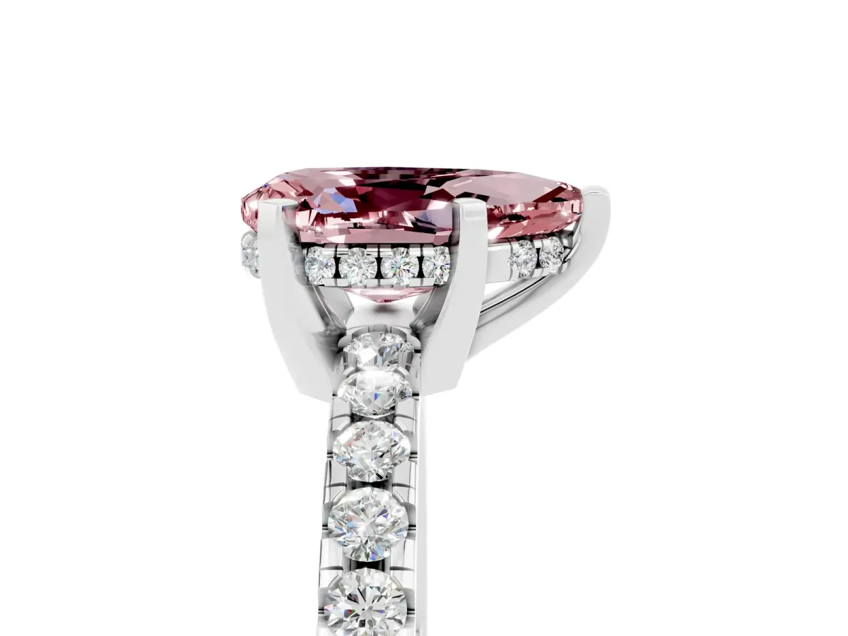 Pear Cut Morganite Solitaire Ring with Round Pavé Band and Four-Prong Setting Silver