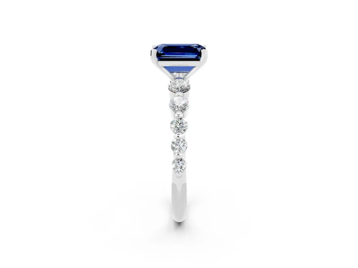 Emerald Cut Solitaire Blue Sapphire Ring with Pave Band and Four-Prong Setting Silver
