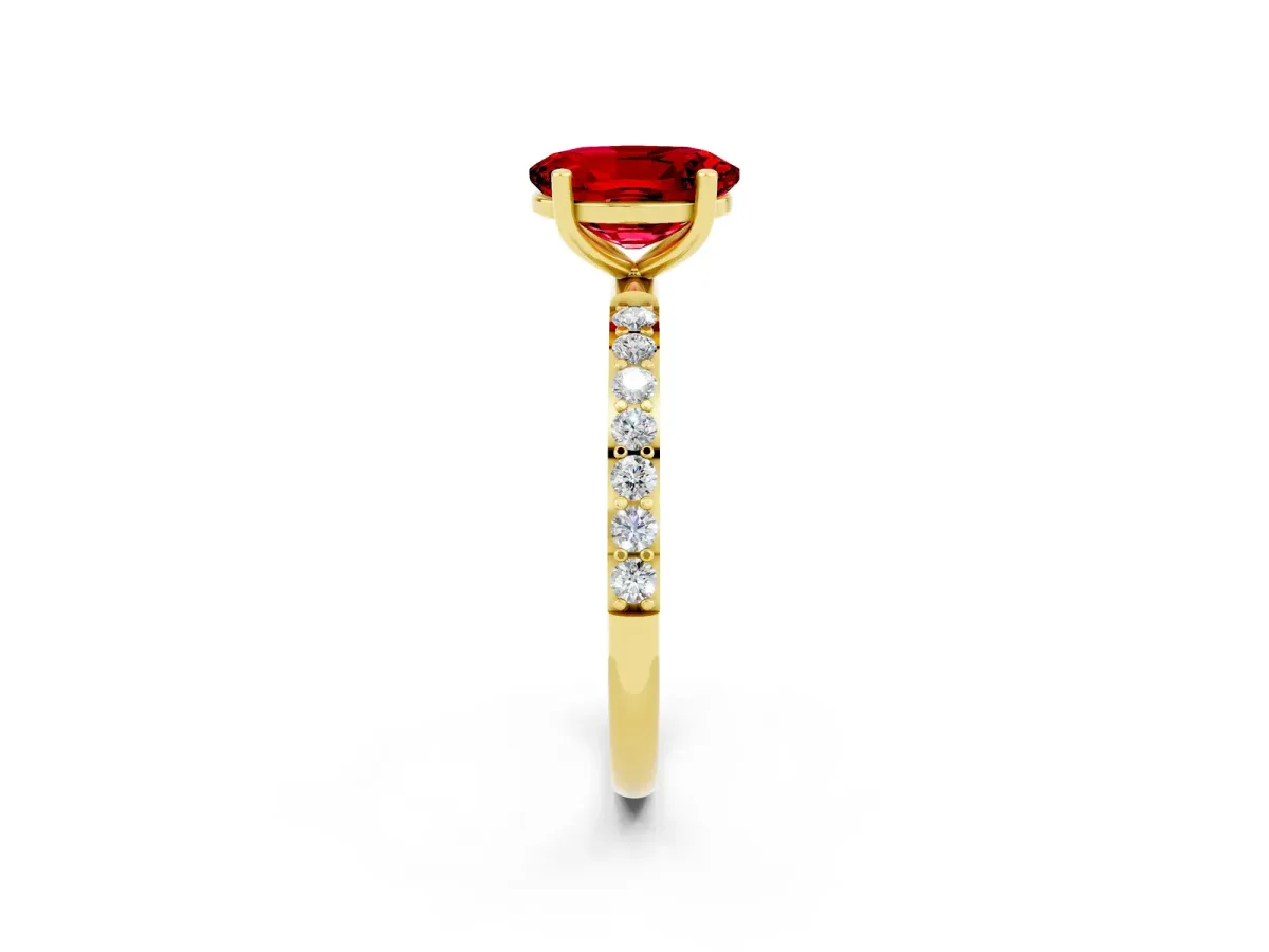 Oval Cut Ruby Solitaire Ring with Round Pavé Band and Prong Setting Yellow gold