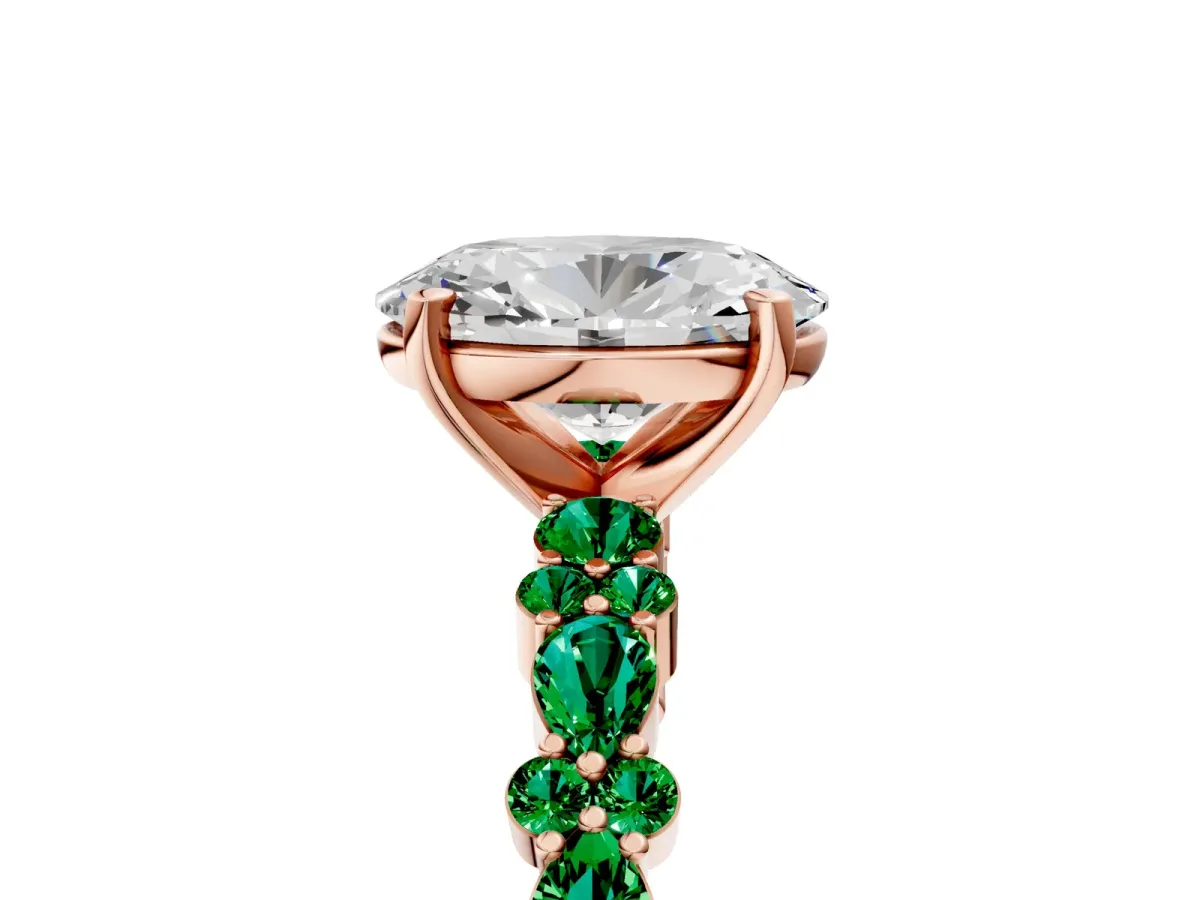 Oval Cut Diamond Side Stone Solitaire Ring with Round Emerald and Four-Prong Setting Rose gold
