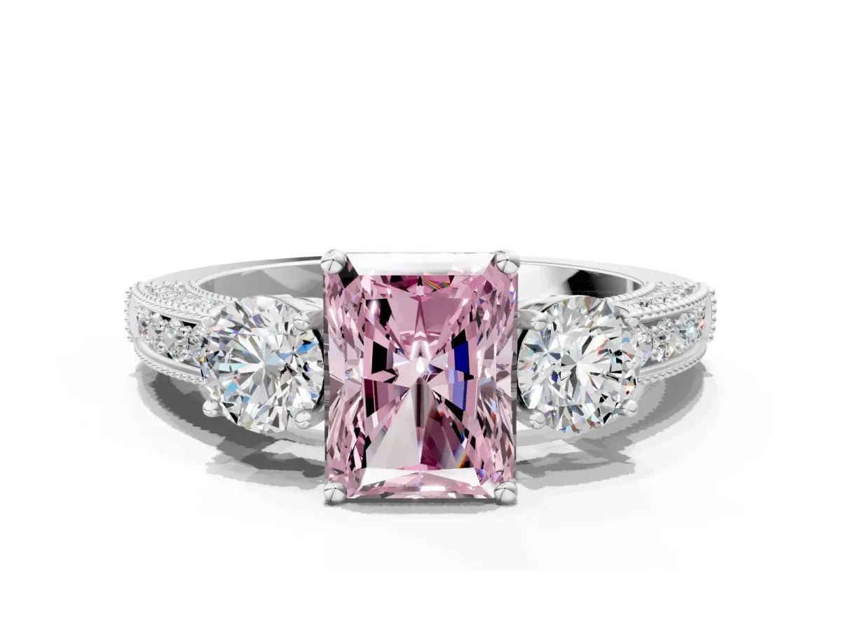 Fancy Pink Radiant Cut Three-Stone Diamond Ring with Pavé Band and Four-Prong Setting Platinum