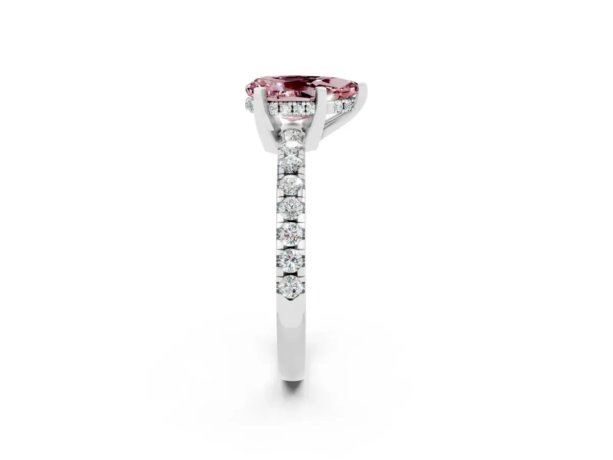 Pear Cut Morganite Solitaire Ring with Round Pavé Band and Four-Prong Setting Silver