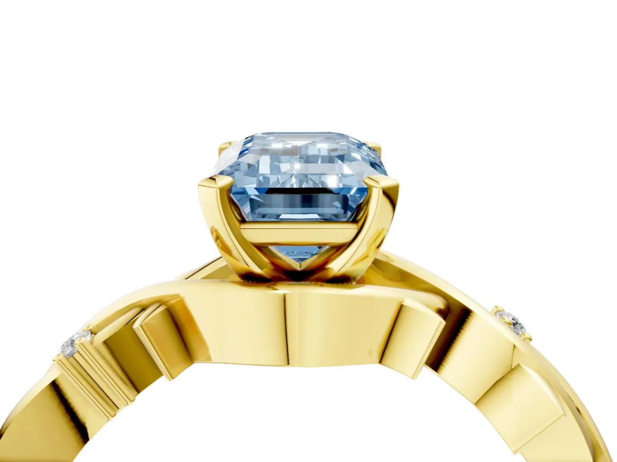 Fancy Blue Emerald Cut Diamond Solitaire Ring with Twisted Band and Prong Setting Yellow gold