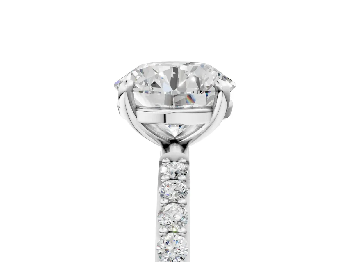Round Cut Diamond Solitaire Ring with Round Moissanite Pavé Band and Prong Setting Silver