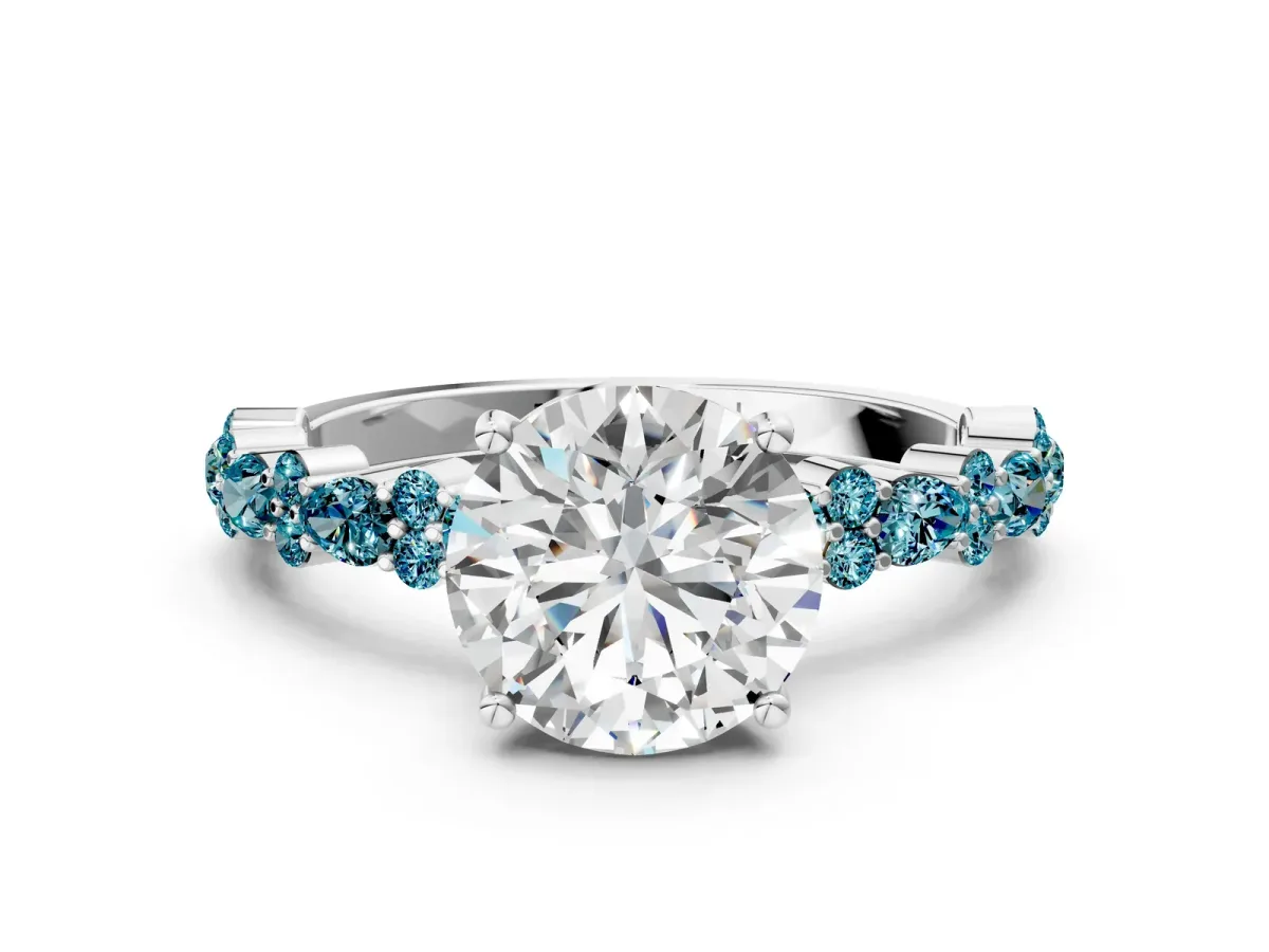 Round Cut Diamond Side Stone Solitaire Ring with Round Blue Topaz and Four-Prong Setting Silver