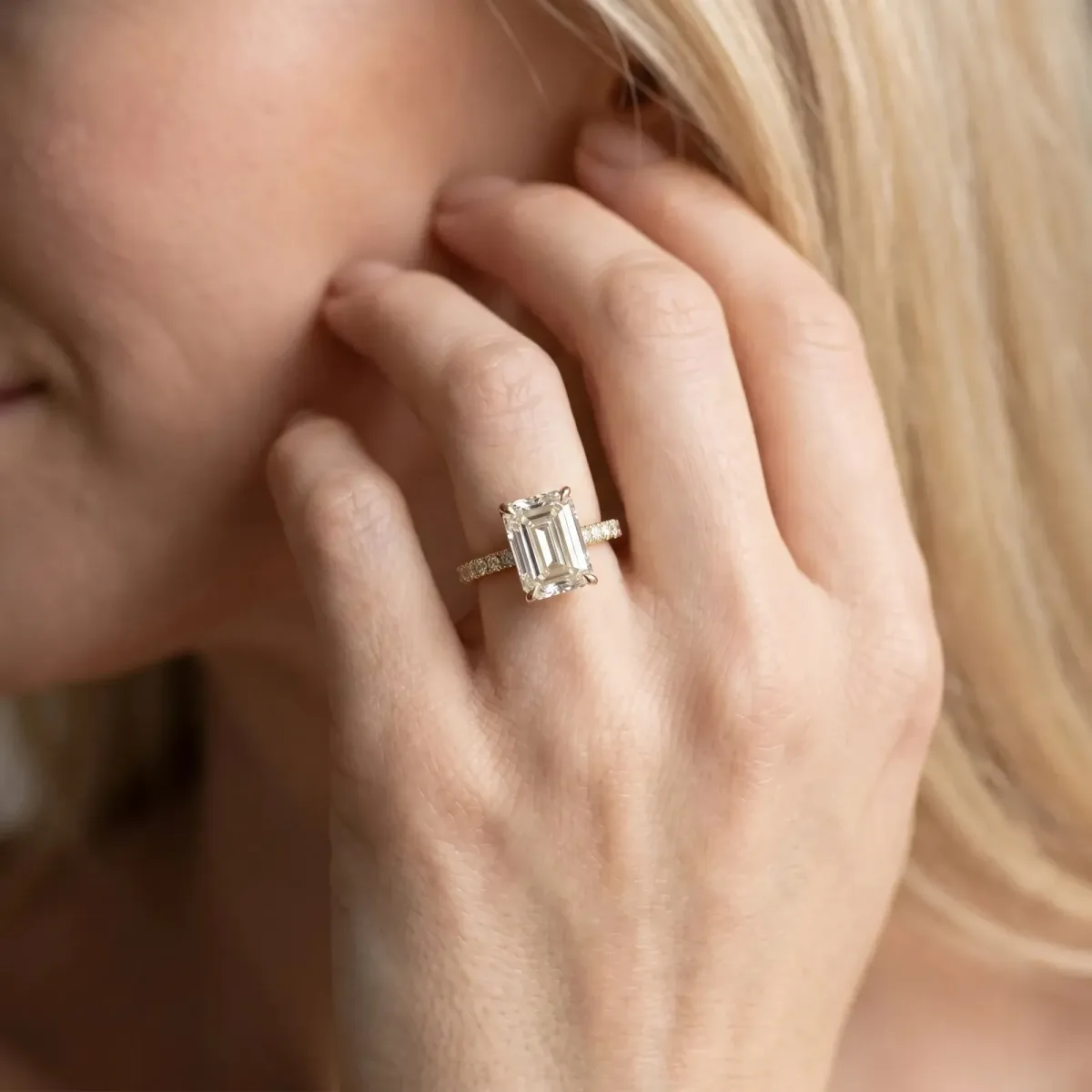 Emerald Cut Diamond Pave Band Solitaire Ring with Round and Prong Setting Yellow gold