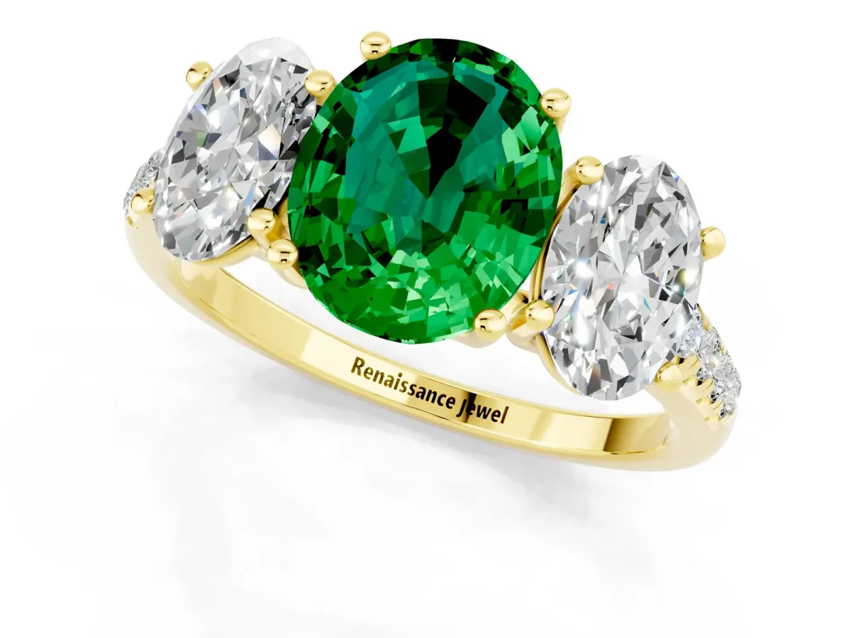 Three-Stone Oval Cut Emerald Ring with Round Pavé Band and Prong Setting Yellow gold