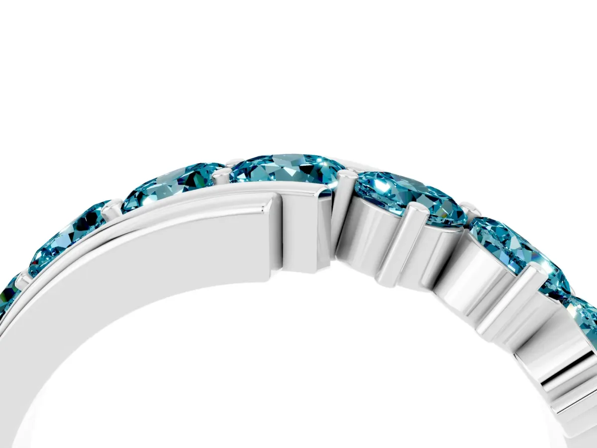 Round Blue Topaz Wave Band with Channel and Shared Prong Setting Silver
