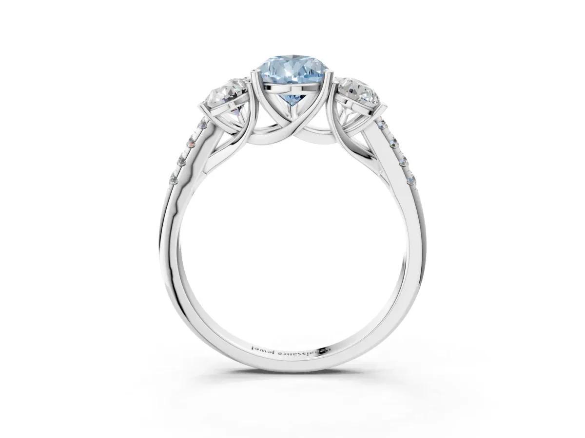 Fancy Blue Three-Stone Pear Cut Diamond Ring with Round Pavé Band and Prong Setting Platinum