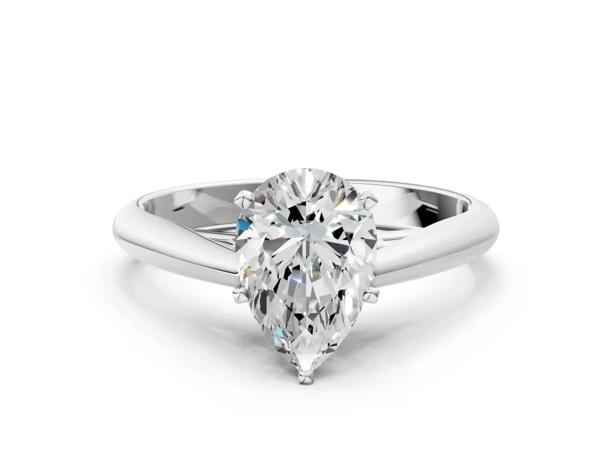 Pear Cut Diamond Solitaire Engagement Ring with Cathedral Setting and Four-Prong Mount White gold