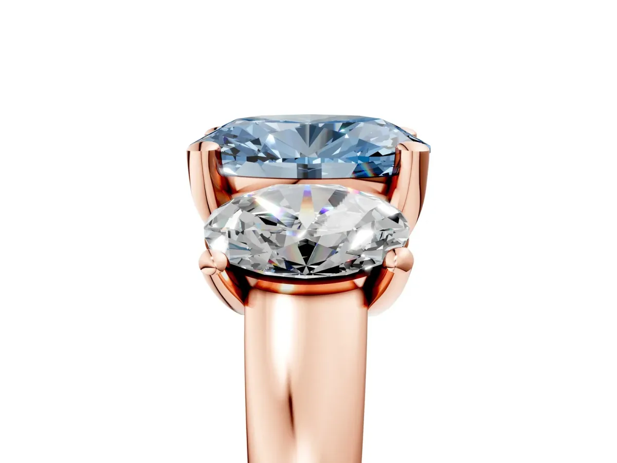 Fancy Blue Three-Stone Oval Cut Cut Solitaire Ring with Classic Prong Setting Rose gold