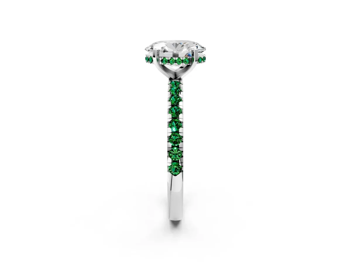 Oval Cut Diamond Solitaire Ring with Round Emerald Pavé Band and Four-Prong Setting Silver