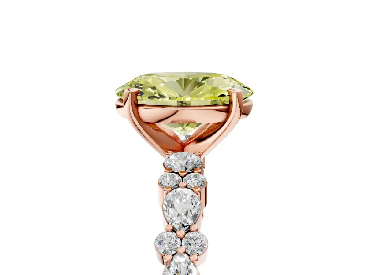 Fancy Yellow Oval Cut Diamond Side Stone Solitaire Ring with Round and Four-Prong Setting Rose gold