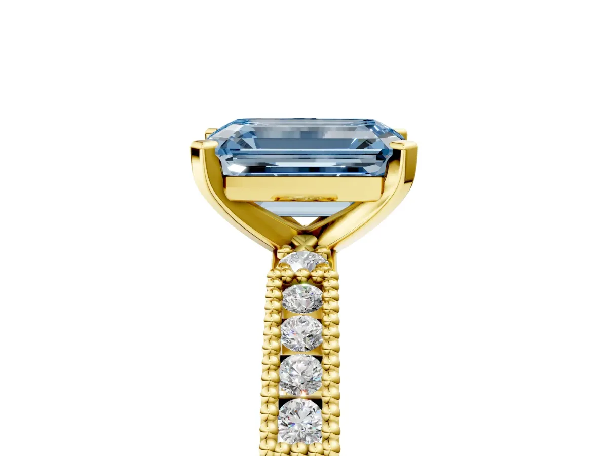Fancy Blue Emerald Cut Solitaire with Pavé Band and Four-Prong Setting Yellow gold