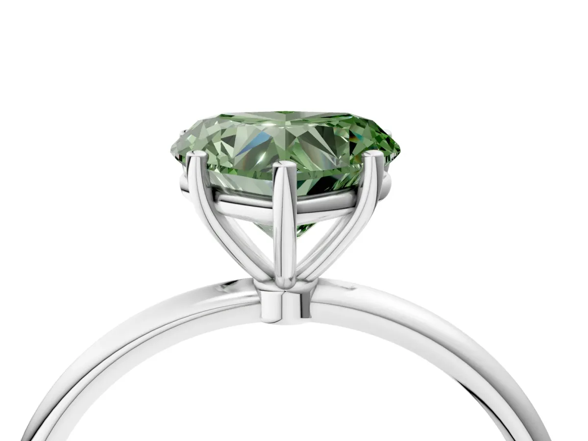 Fancy Green Heart Cut Cut Solitaire Engagement Ring with Thin Band and Four-Prong Setting Platinum