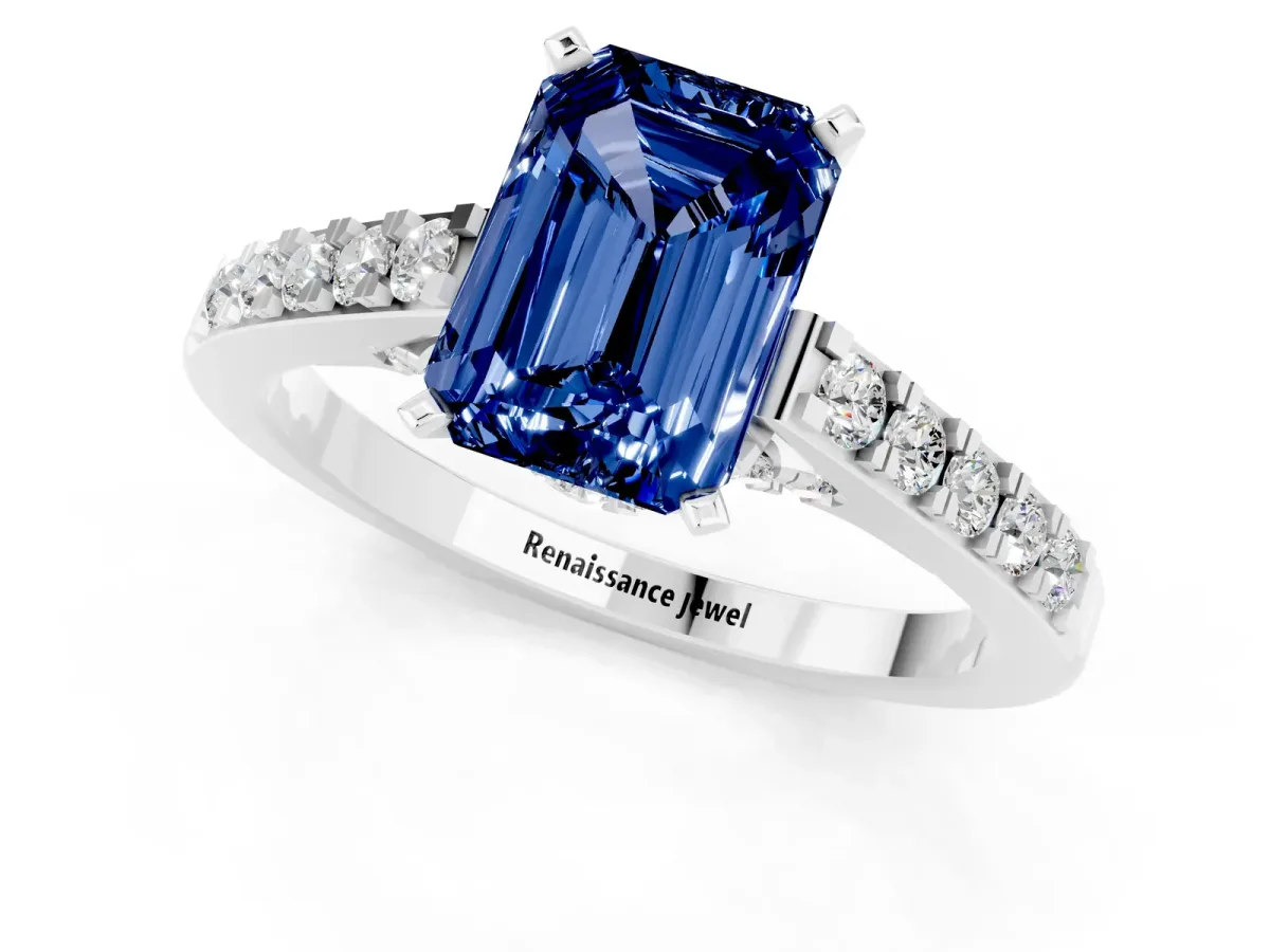 Emerald Cut Blue Sapphire Solitaire Ring with Crossover Gallery and Round Pavé Band Silver