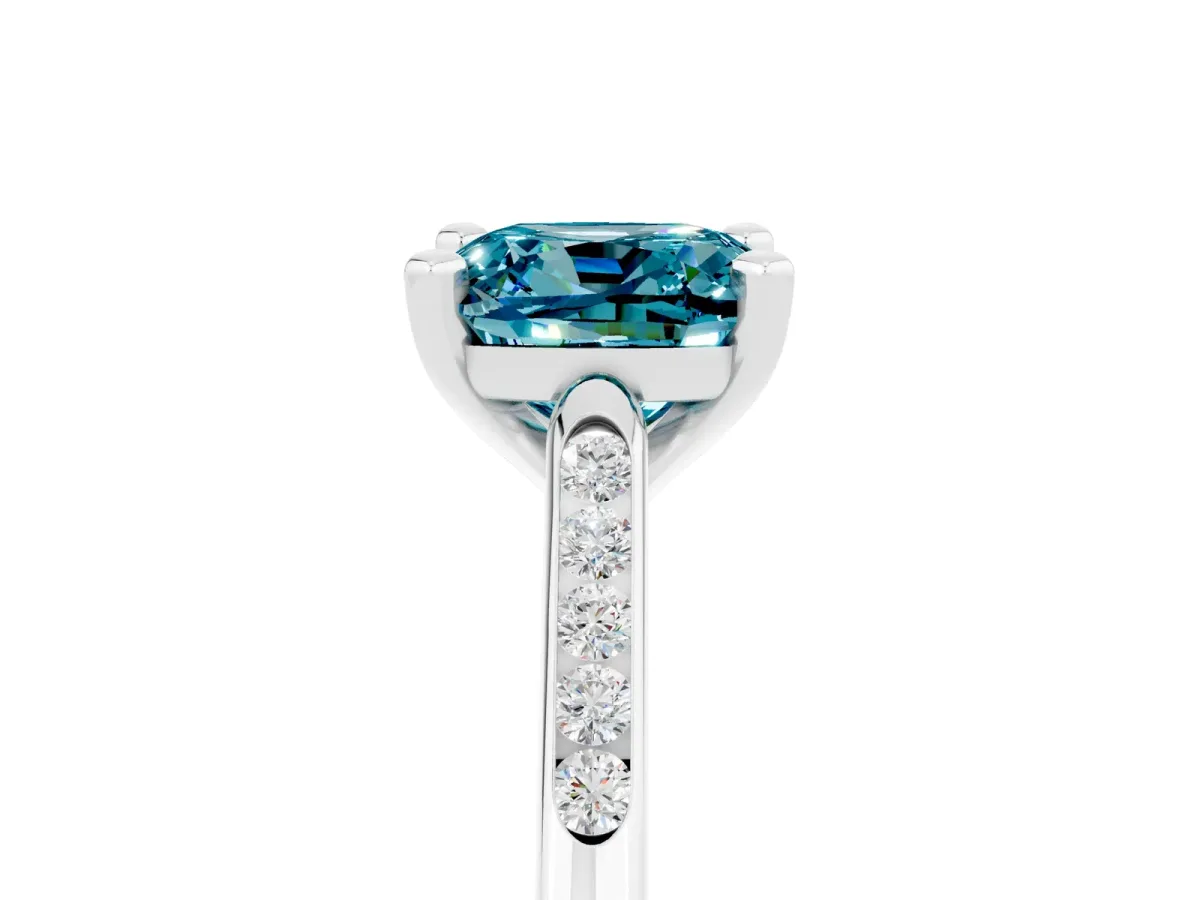 Cushion Cut Blue Topaz Solitaire Ring with Channel Set Round Band and Prong Setting Silver