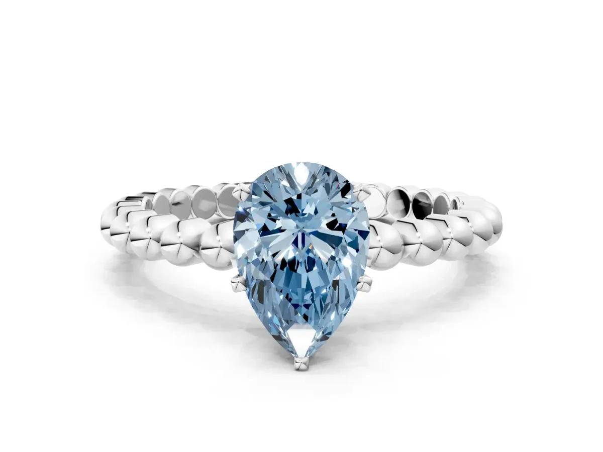 Fancy Blue Pear Cut Diamond Solitaire Ring with Beaded Band and Prong Setting Silver