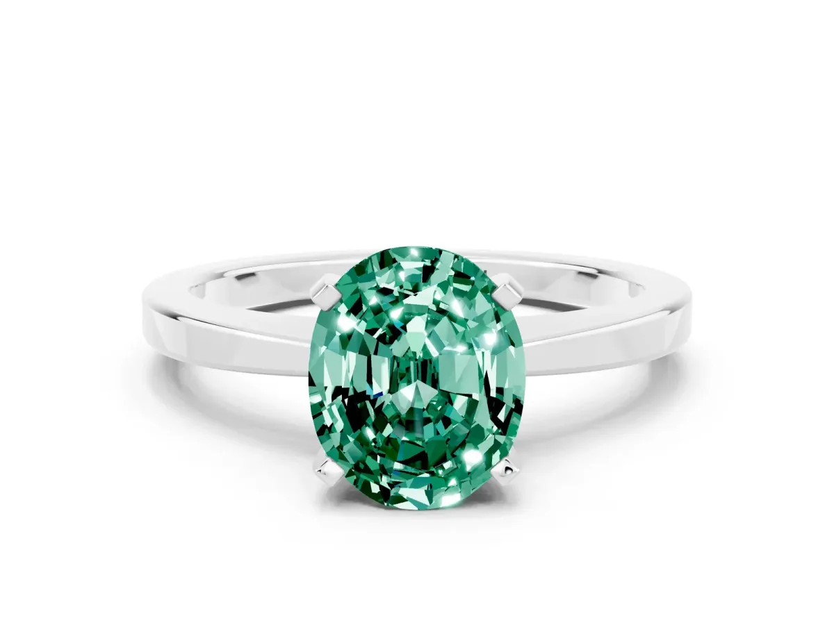 Oval Cut Green Sapphire Solitaire Engagement Ring with Classic Band and Four-Prong Setting Silver