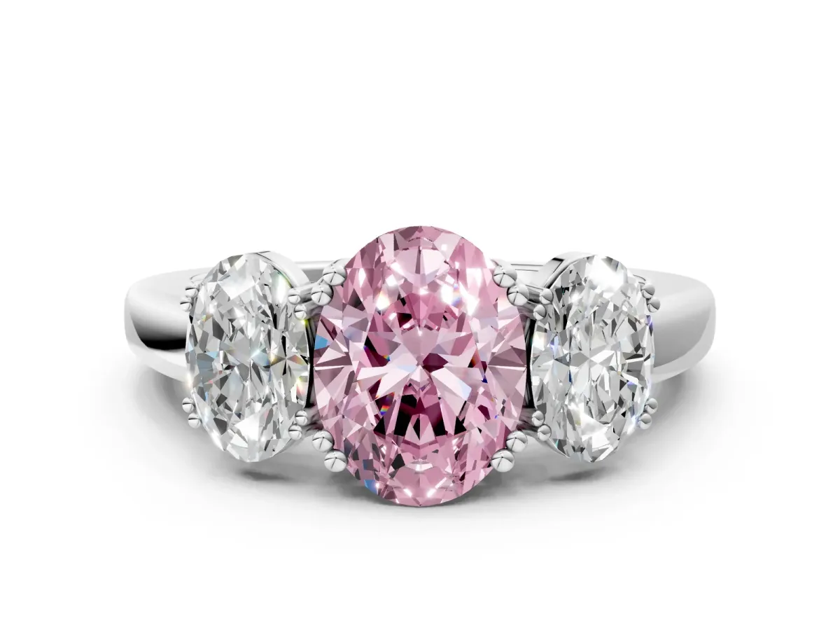 Fancy Pink Three-Stone Oval Cut Cut Diamond Ring with Channel Set Band and Four-Prong Setting Silver