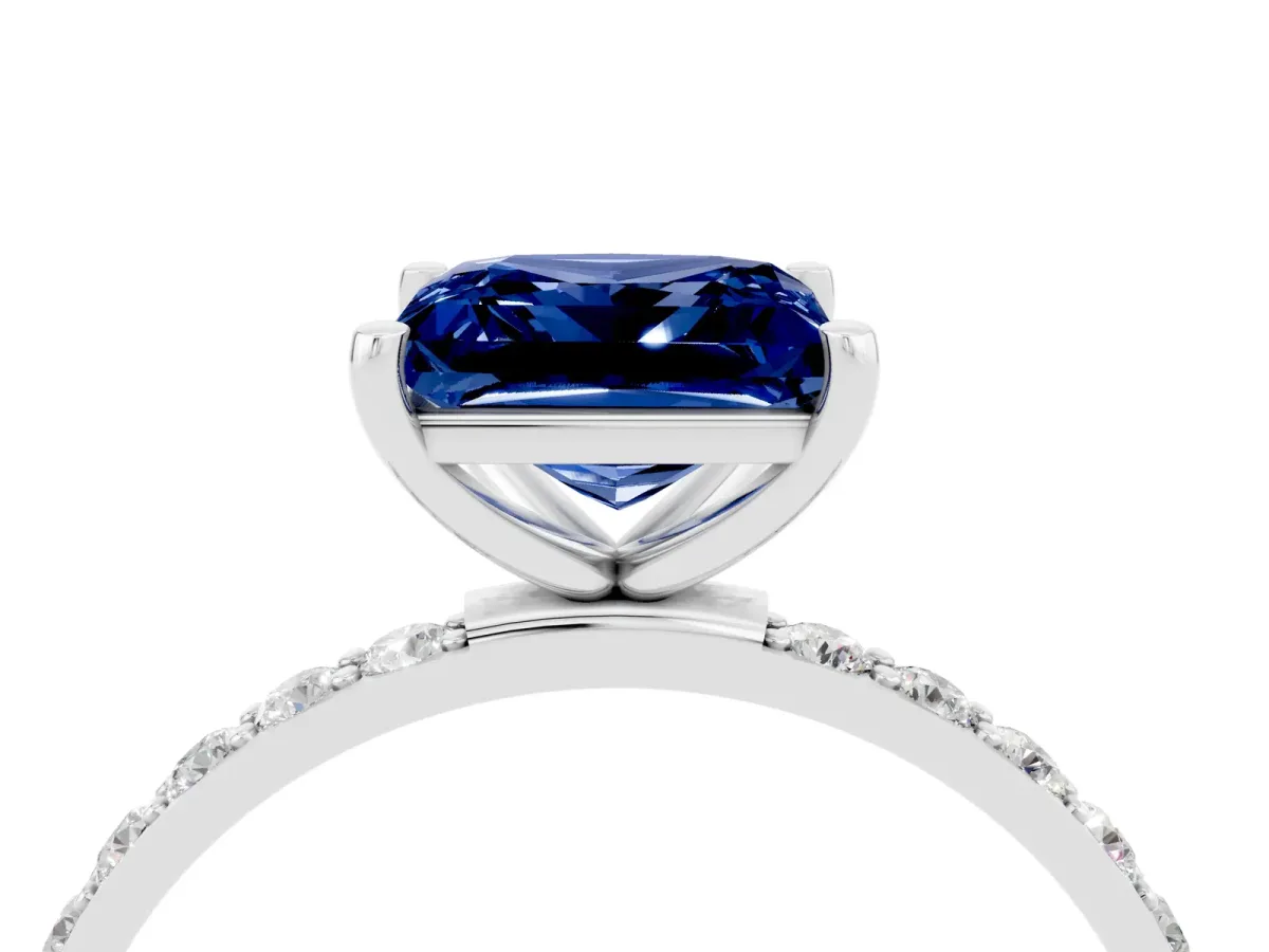 Princess Cut Blue Sapphire Solitaire Ring with Round Pavé Band and Prong Setting Silver