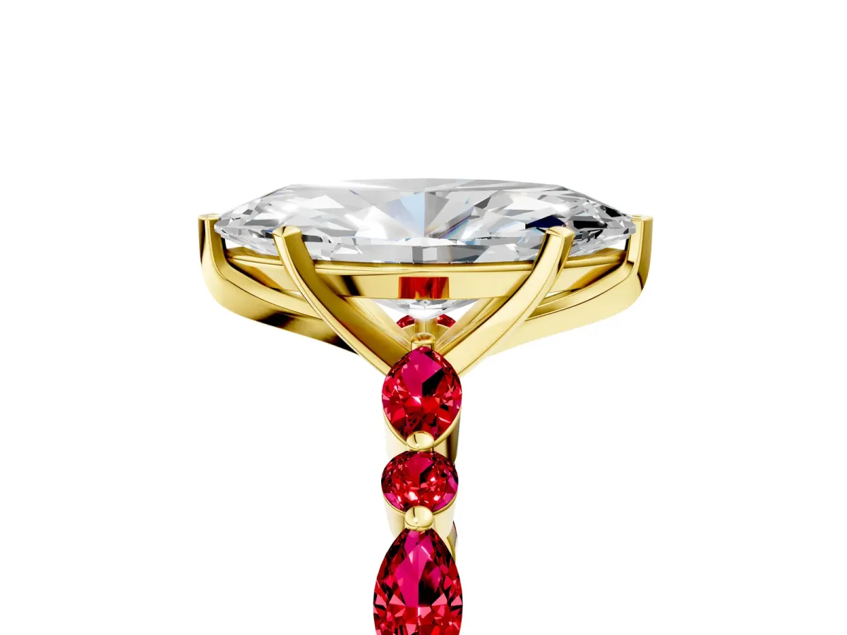 Marquise Cut Diamond Ring with Marquise and Round Ruby Side Stones and Four-Prong Setting Yellow gold