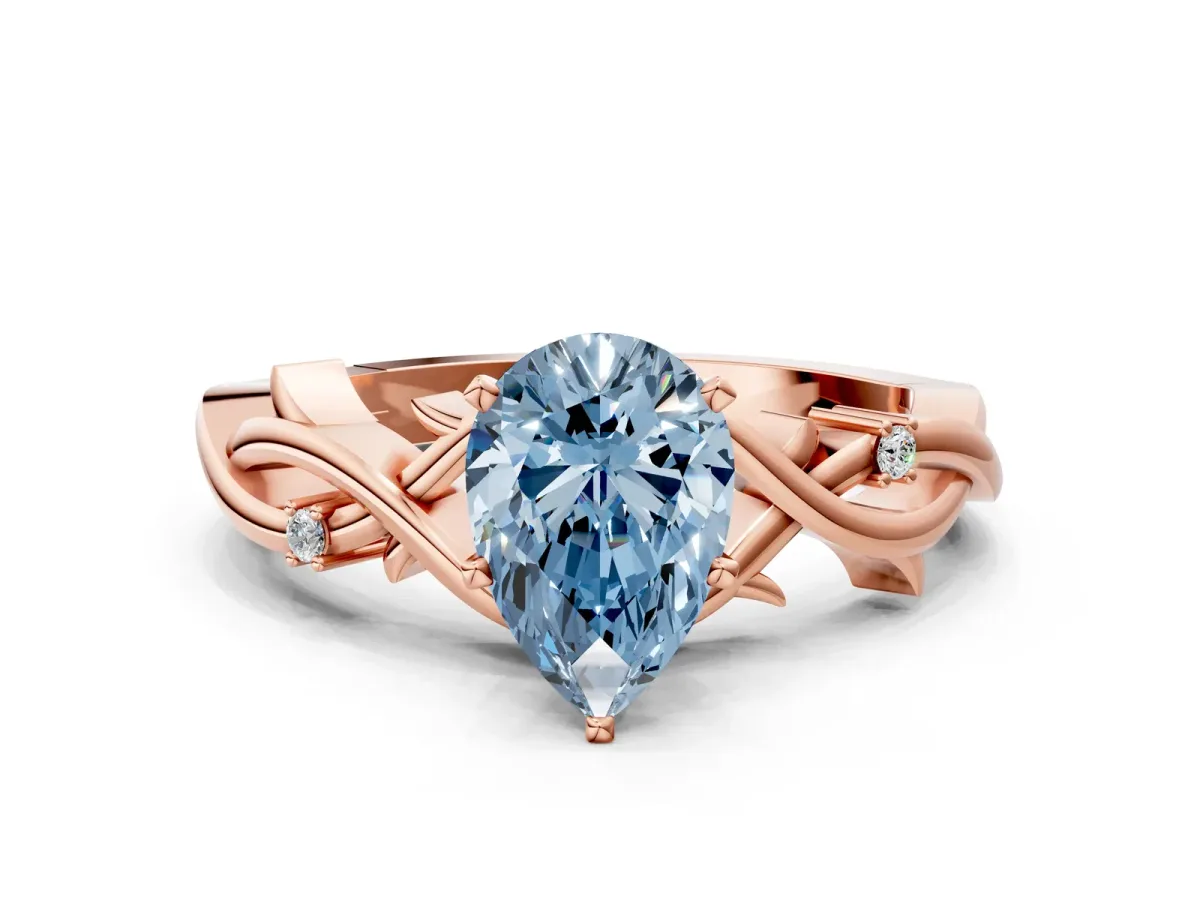 Fancy Blue Pear Cut Diamond Solitaire Ring with Twisted Band and Prong Setting Rose gold