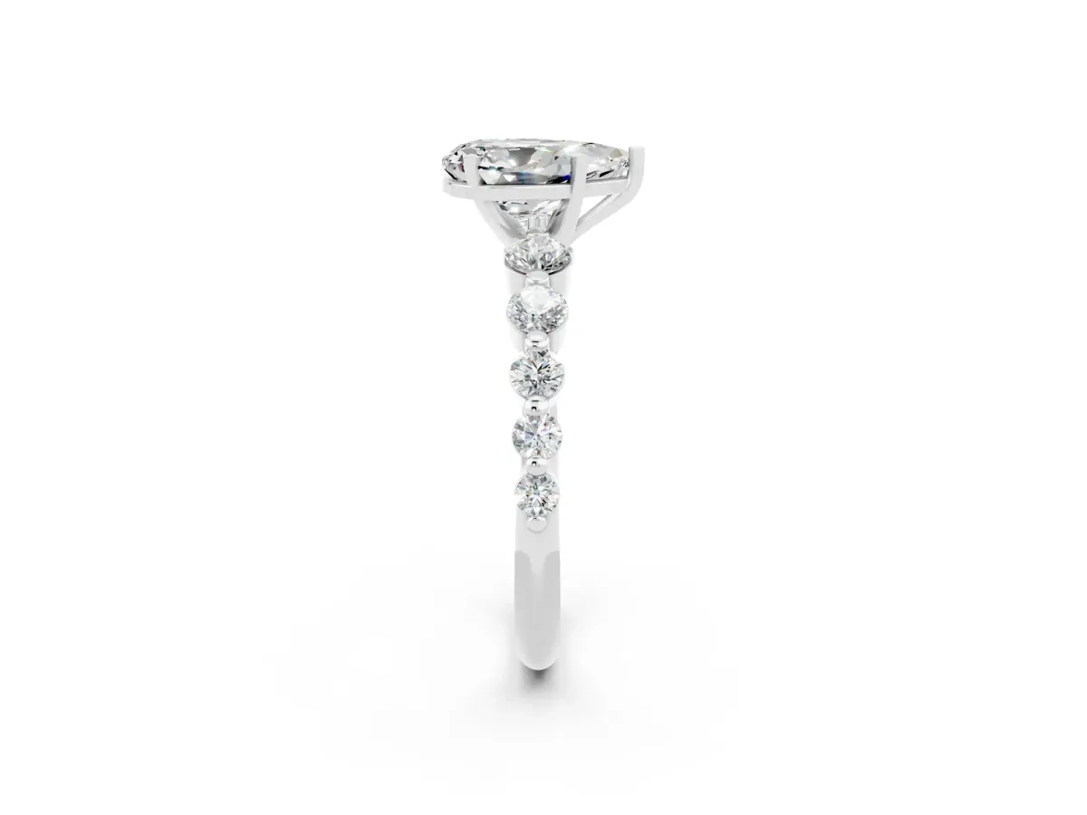 Pear Cut Solitaire Moissanite Ring with Pave Band and Four-Prong Setting Silver