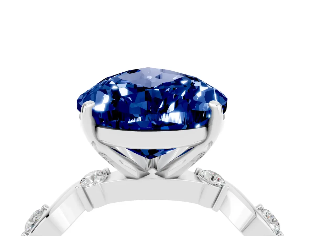 Pear Cut Blue Sapphire Solitaire Twisted Band with Round Accents and Prong Setting Silver