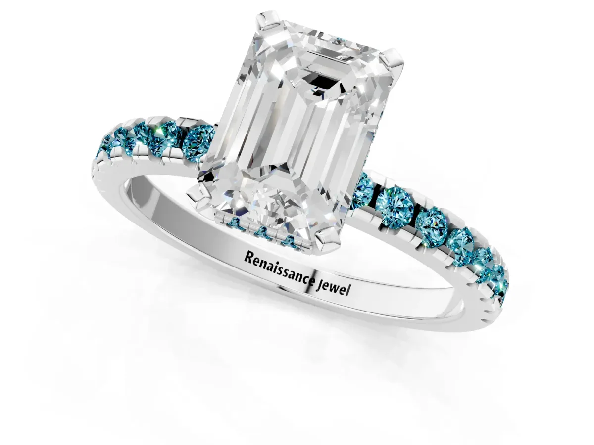 Emerald Cut Diamond Solitaire Ring with Round Blue Topaz Pavé Band and Four-Prong Setting Silver