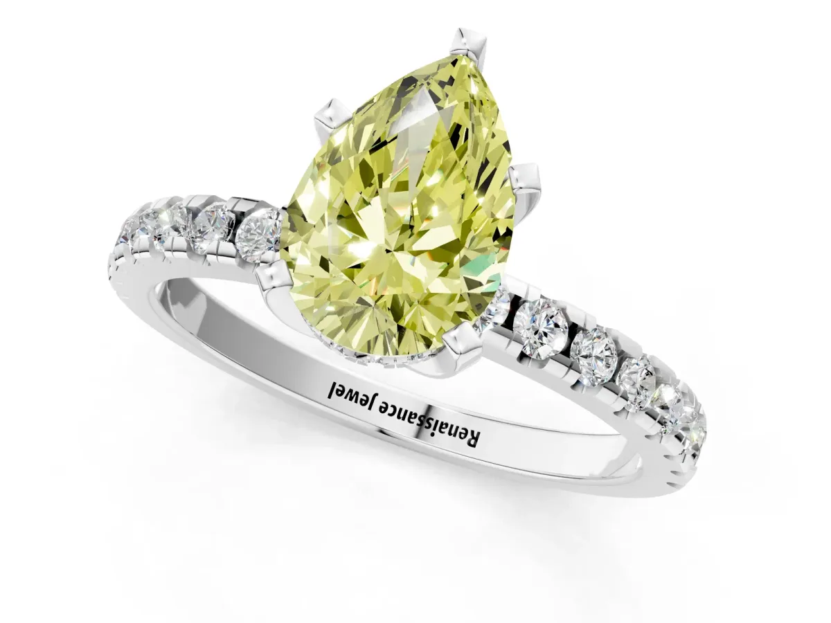 Fancy Yellow Pear Cut Diamond Solitaire Ring with Round Pavé Band and Four-Prong Setting Silver