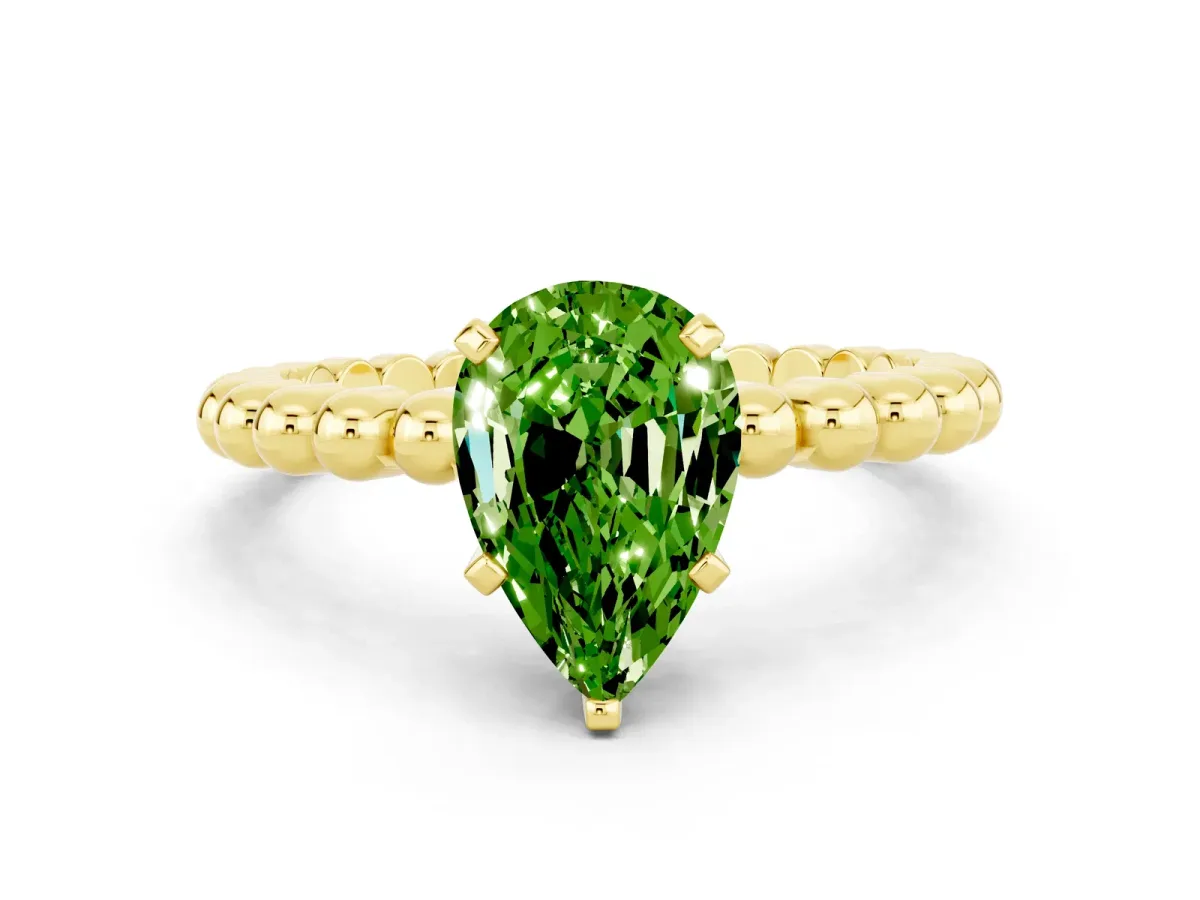 Pear Cut Peridot Solitaire Ring with Beaded Band and Prong Setting Yellow gold