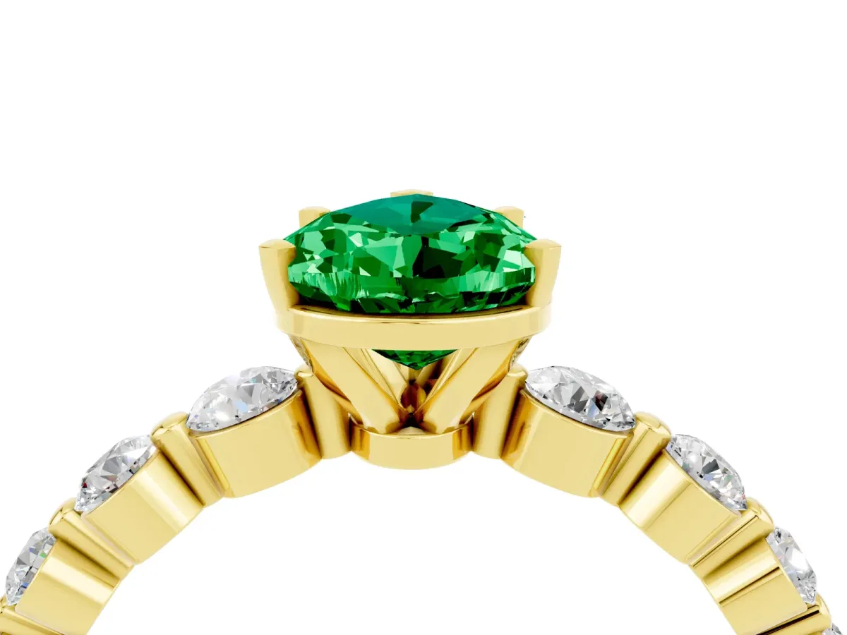 Pear Cut Solitaire Emerald Ring with Pave Band and Four-Prong Setting Yellow gold