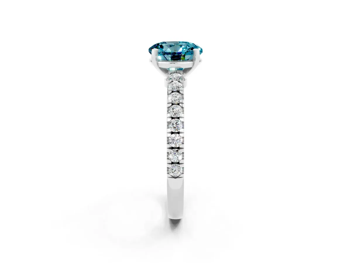 Round Cut Solitaire Blue Topaz with Pavé Band and Four-Prong Setting Silver