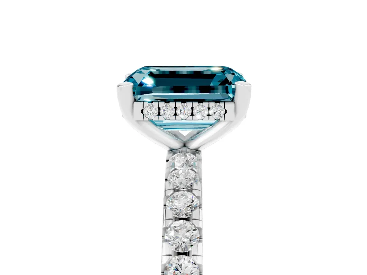 Emerald Cut Blue Topaz Solitaire Ring with Round Pavé Band and Four-Prong Setting Silver