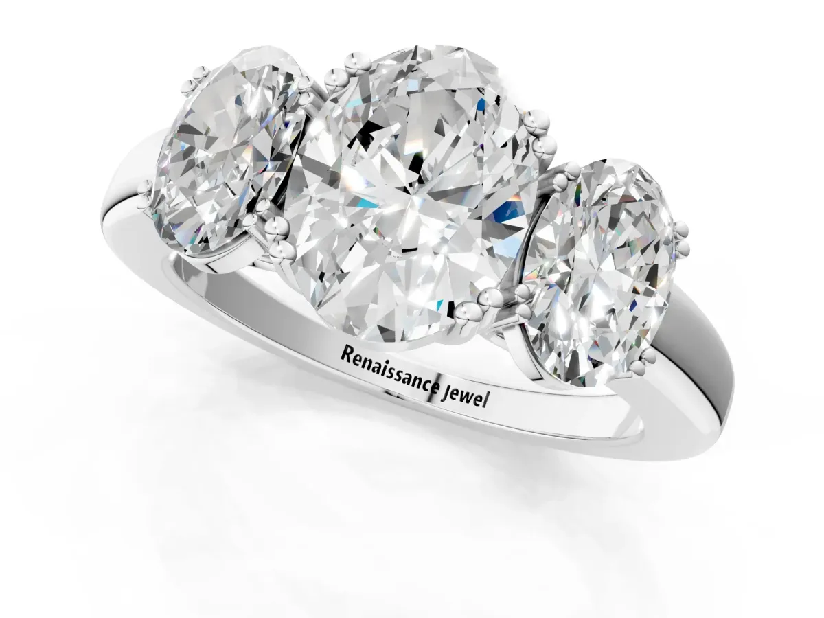 Three-Stone Oval Cut Cut Diamond Ring with Channel Set Band and Four-Prong Setting White gold