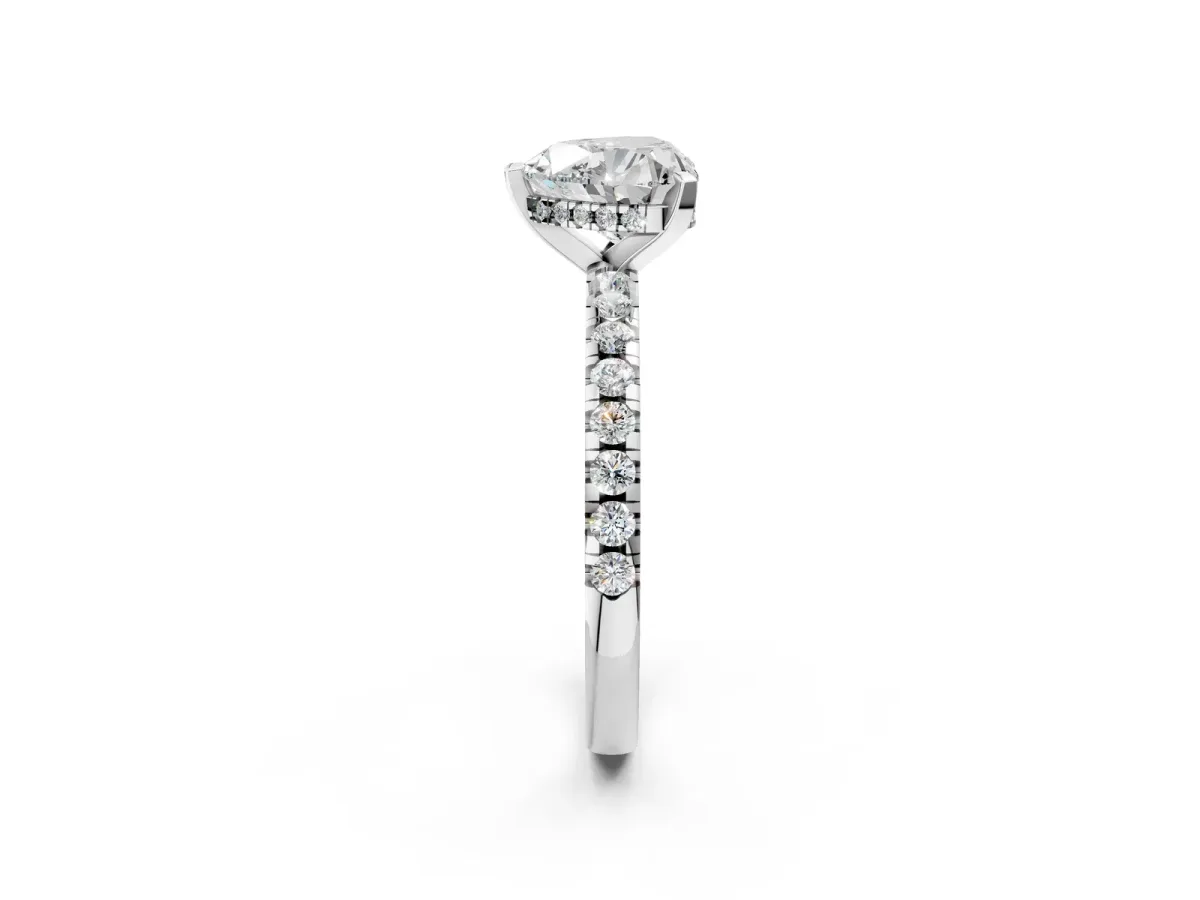 Heart Cut Diamond Solitaire Ring with Round Pavé Band and Four-Prong Setting Silver